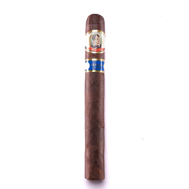 Cigar with a band on a white background