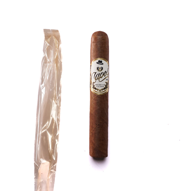 Cigar and its packaging on a white background