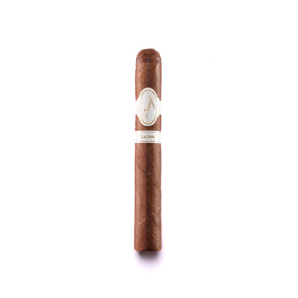Cigar with a band on a white background
