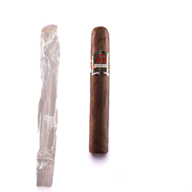 Cigar and rolling paper on a white background