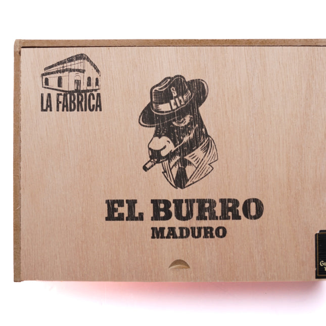 Cardboard box with 'El Burro Maduro' branding and 'La Fabrica' text on a white background