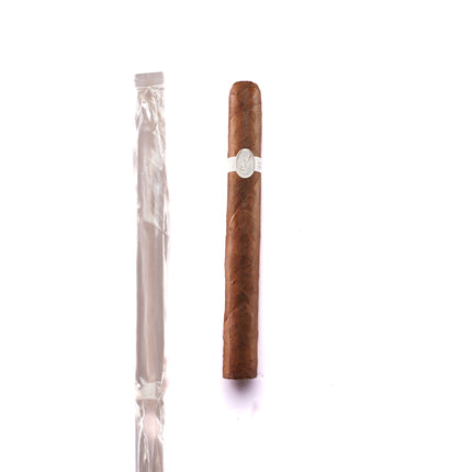 Cigar and its packaging on a white background