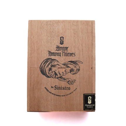 Wooden box with 'Honor Among Thieves' and 'Sinistro' branding on a white background