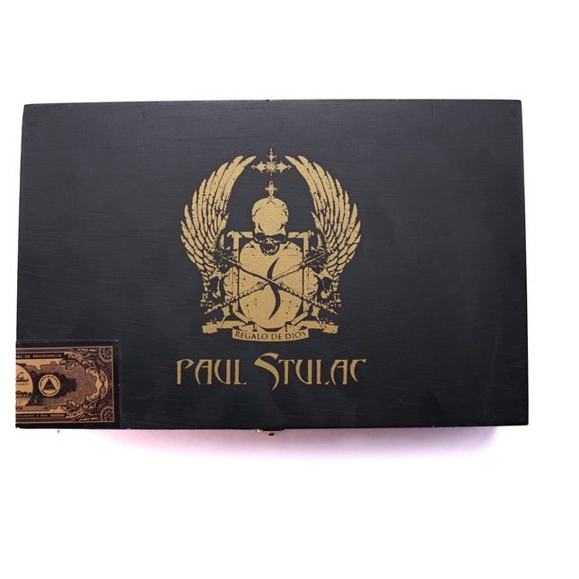 Black box with gold emblem and 'Paul Stulac' branding on a white background