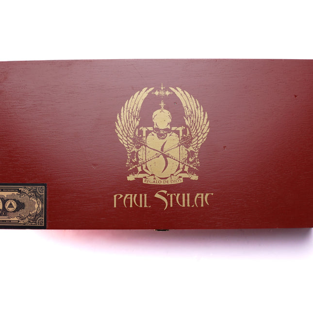 Red box with gold emblem and 'Paul Stulac' text on a white background