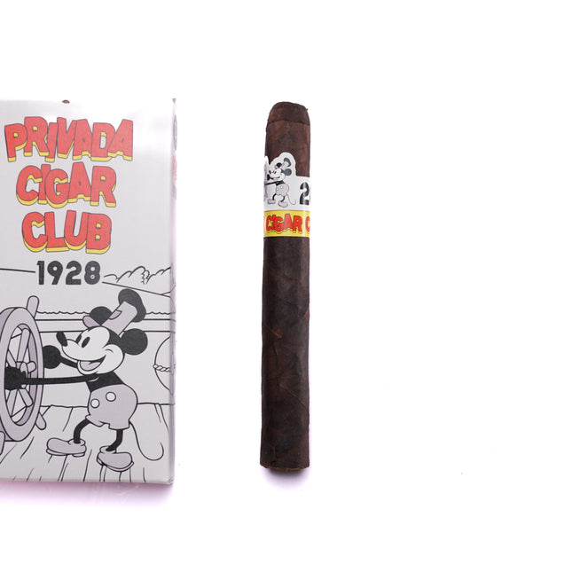 Cigar and packaging with 'Privado Cigar Club 1928' branding on a white background