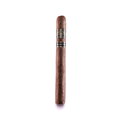 Single cigar with band on a white background