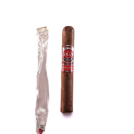 Cigar and its packaging on a white background