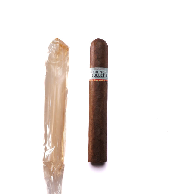 Cigar and a plastic-wrapped item on a white background