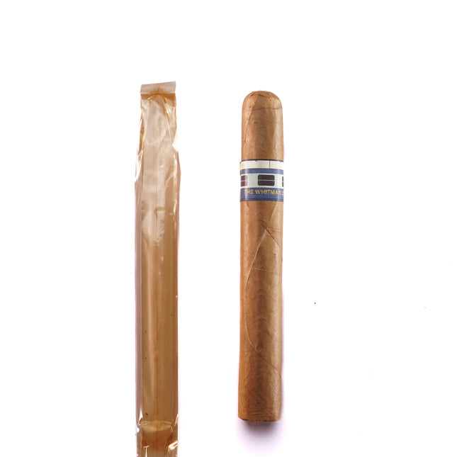 Two cigars, one unlit and one lit, on a white background
