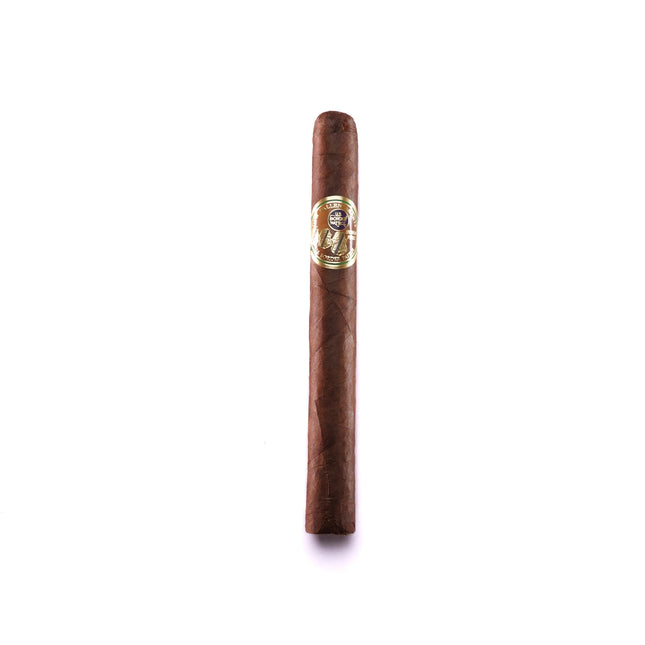 Cigar with a gold band on a white background