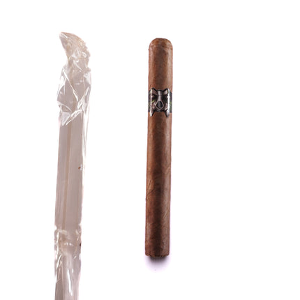 Cigar and knife on a white background