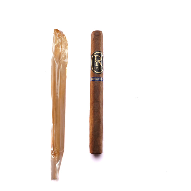 Cigar and cutter on a white background